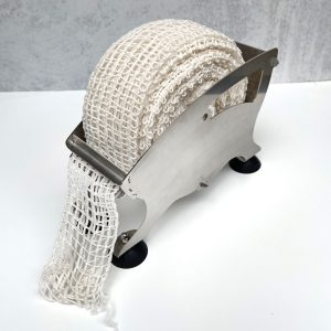 The Sausage Maker netting roll dispenser for easy storage and dispensing of netting