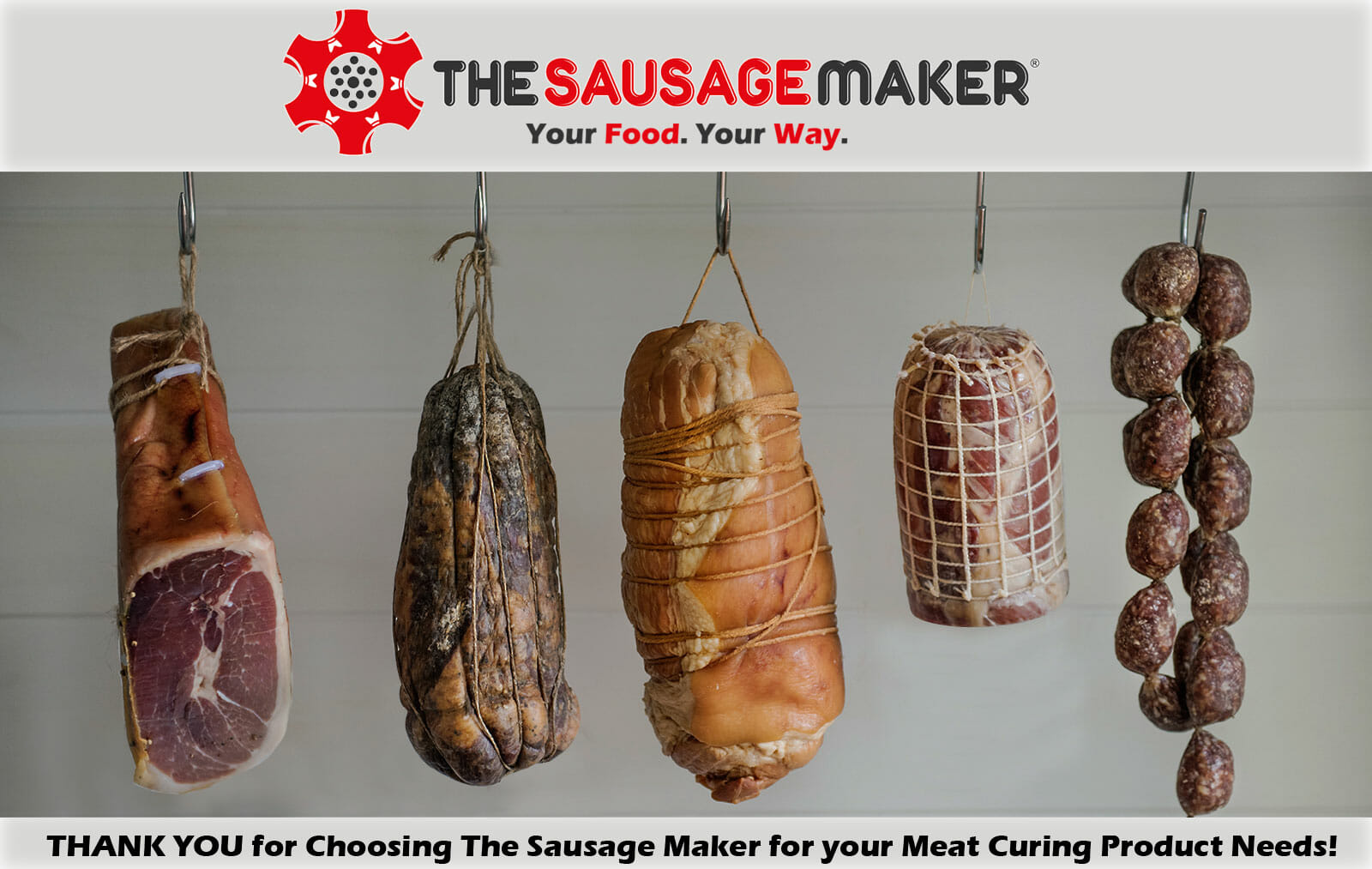 Cured meats hanging for drying using The Sausage Maker supplies